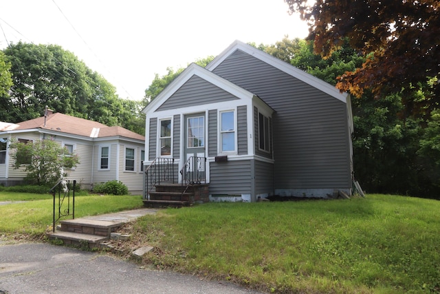 1 Chadwick St, Winslow, ME 04901 - view of front of property featuring a front yard