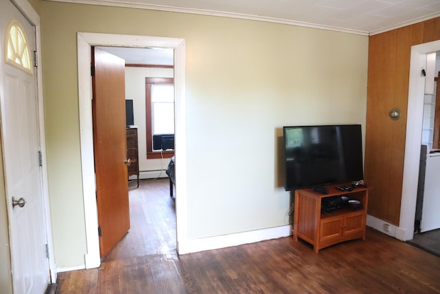 1 Chadwick St, Winslow, ME 04901 - living area featuring ornamental molding, wood finished floors, a baseboard radiator, and baseboards