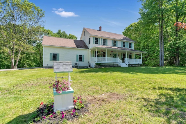 1505 Foxes Ridge Rd, Acton, ME 04001 - view of front of house featuring a porch, a front yard, and a chimney