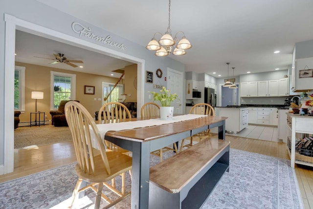 1505 Foxes Ridge Rd, Acton, ME 04001 - dining space with baseboard heating, light wood finished floors, a chandelier, ceiling fan, and recessed lighting