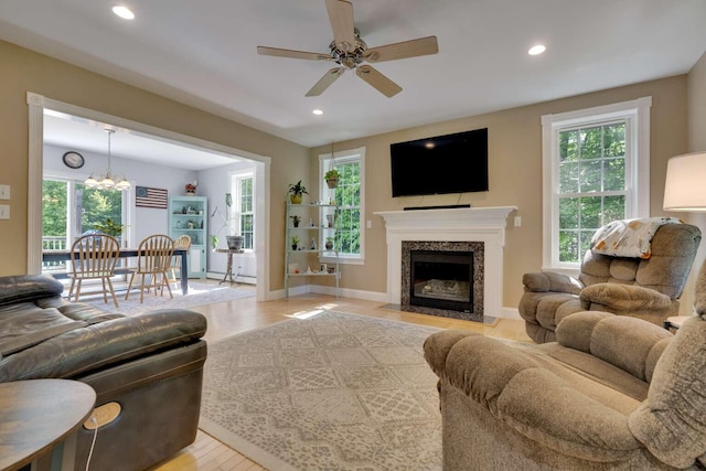 1505 Foxes Ridge Rd, Acton, ME 04001 - living area with light wood finished floors, healthy amount of natural light, a ceiling fan, and recessed lighting