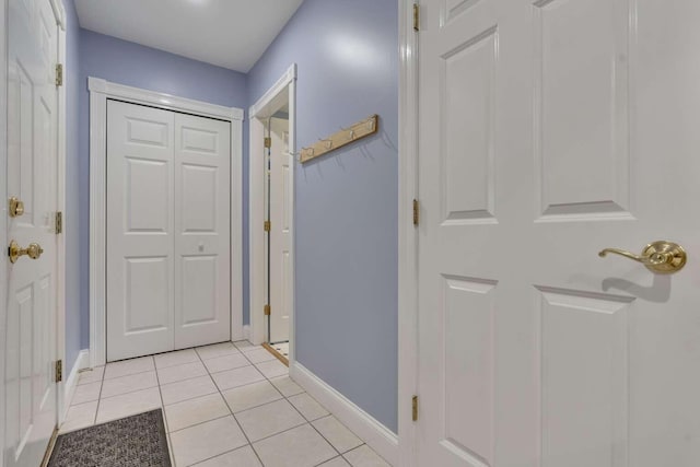 1505 Foxes Ridge Rd, Acton, ME 04001 - hall with light tile patterned floors and baseboards