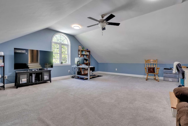 1505 Foxes Ridge Rd, Acton, ME 04001 - living area featuring vaulted ceiling, carpet, and a ceiling fan