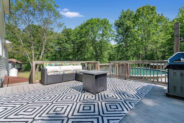 1505 Foxes Ridge Rd, Acton, ME 04001 - wooden deck featuring outdoor lounge area, a grill, and view of wooded area