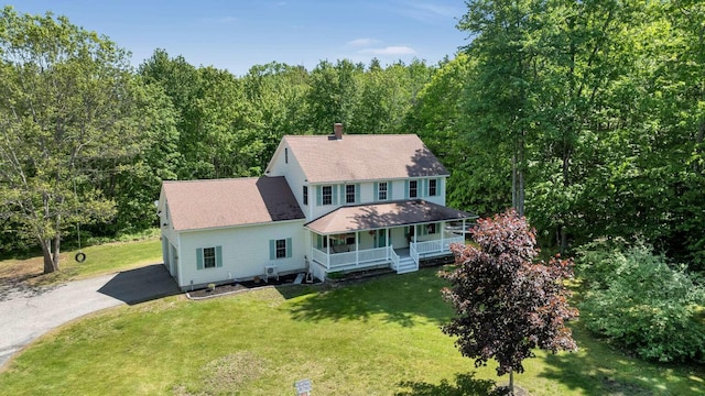 1505 Foxes Ridge Rd, Acton, ME 04001 - back of property featuring a porch, a chimney, a yard, and driveway