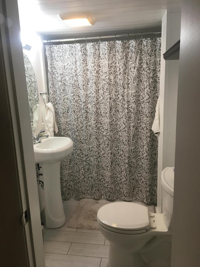 3 Baker St, Winslow, ME 04901 - bathroom with toilet and a shower with curtain