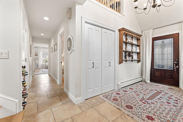 59 Meadow Ln, Ogunquit, ME 03907 - foyer entrance featuring baseboard heating, a chandelier, recessed lighting, and baseboards