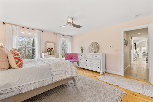 59 Meadow Ln, Ogunquit, ME 03907 - bedroom featuring light wood-type flooring, ceiling fan, and baseboards