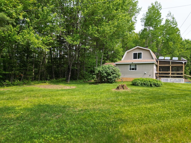 140 Station Rd, Lincoln, ME 04457 - view of grassy yard featuring a sunroom