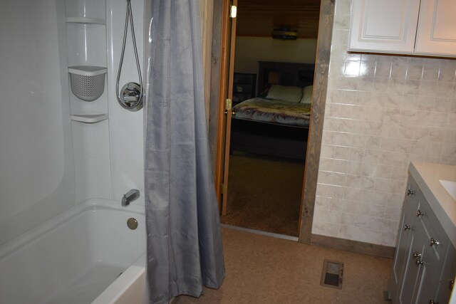 140 Station Rd, Lincoln, ME 04457 - ensuite bathroom featuring vanity and shower / bath combination with curtain