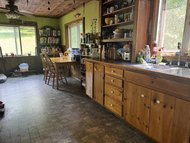 20 Coldbrook Rd, Hampden, ME 04444 - kitchen featuring a ceiling fan, healthy amount of natural light, open shelves, and brown cabinets