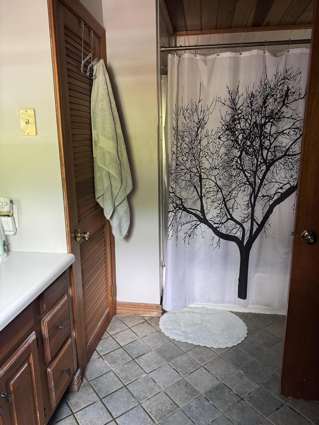 20 Coldbrook Rd, Hampden, ME 04444 - bathroom featuring vanity, baseboards, and a shower with curtain