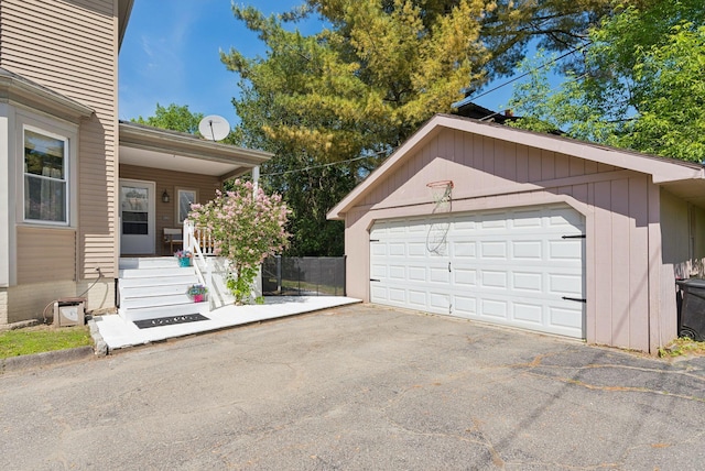 13 Bartlett St, Waterville, ME 04901 - detached garage featuring a porch
