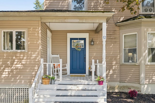 13 Bartlett St, Waterville, ME 04901 - property entrance featuring covered porch