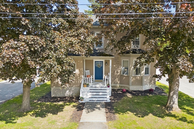 13 Bartlett St, Waterville, ME 04901 - obstructed view of property with a front yard