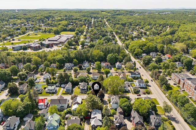 13 Bartlett St, Waterville, ME 04901 - aerial perspective of suburban area featuring a heavily wooded area