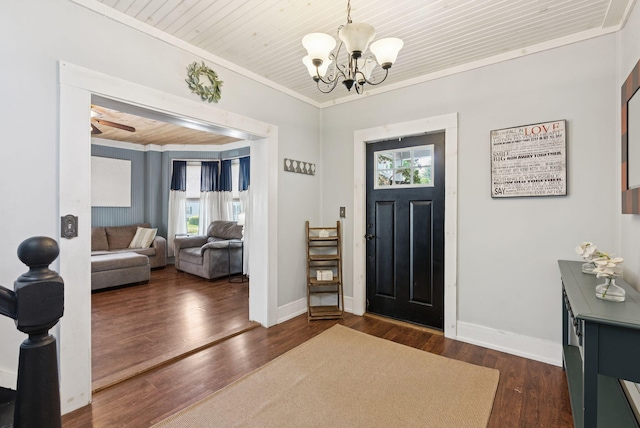 13 Bartlett St, Waterville, ME 04901 - foyer with a chandelier, crown molding, dark wood-style floors, baseboards, and wood ceiling