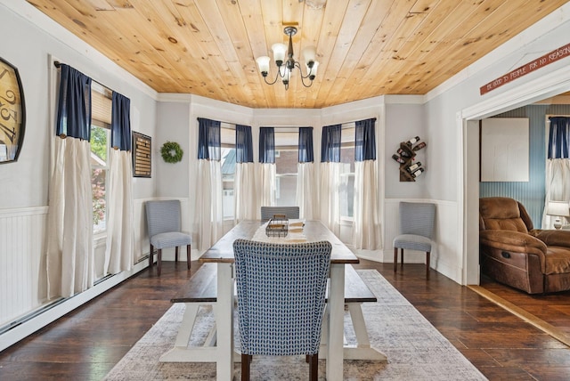 13 Bartlett St, Waterville, ME 04901 - dining area with a baseboard heating unit, ornamental molding, a chandelier, a wainscoted wall, and dark wood-style floors