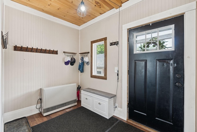 13 Bartlett St, Waterville, ME 04901 - mudroom with heating unit, dark wood-style flooring, baseboards, and wood ceiling