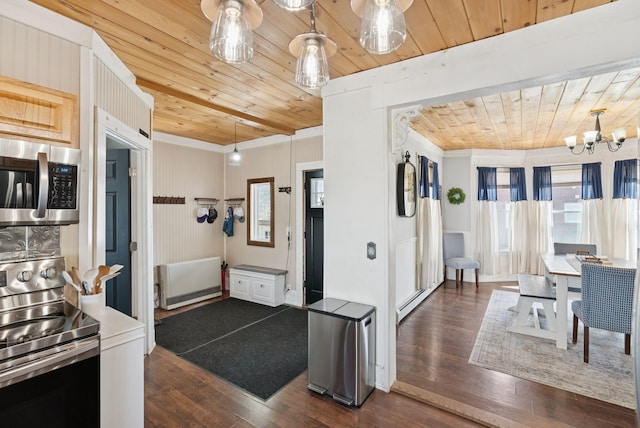 13 Bartlett St, Waterville, ME 04901 - kitchen with stainless steel appliances, wooden ceiling, dark wood-type flooring, a chandelier, and ornamental molding
