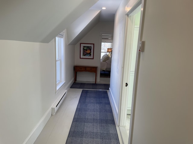 138 Limerock St Unit A, Rockland, ME 04841 - bonus room with baseboard heating, vaulted ceiling, baseboards, and recessed lighting