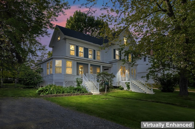 11 Center St, Richmond, ME 04357 - view of front of property featuring stairs, covered porch, and a front lawn