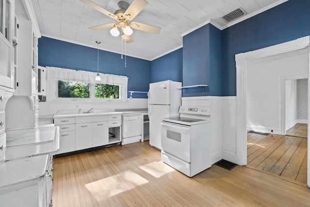 11 Center St, Richmond, ME 04357 - kitchen featuring white appliances, ornamental molding, ceiling fan, light wood-style floors, and white cabinets
