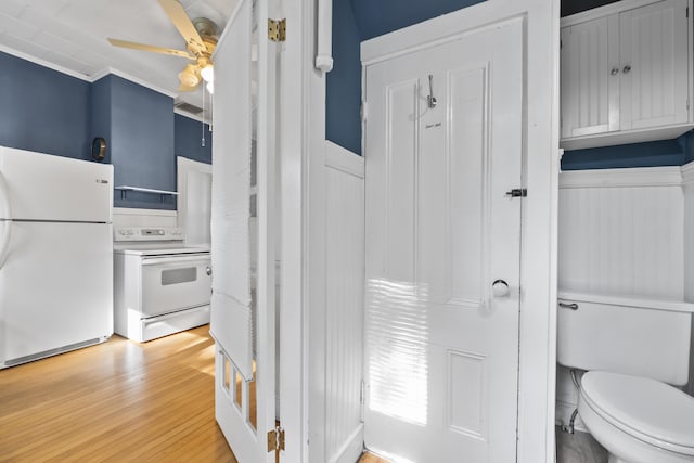 11 Center St, Richmond, ME 04357 - interior space featuring white appliances, a ceiling fan, and light wood-style floors