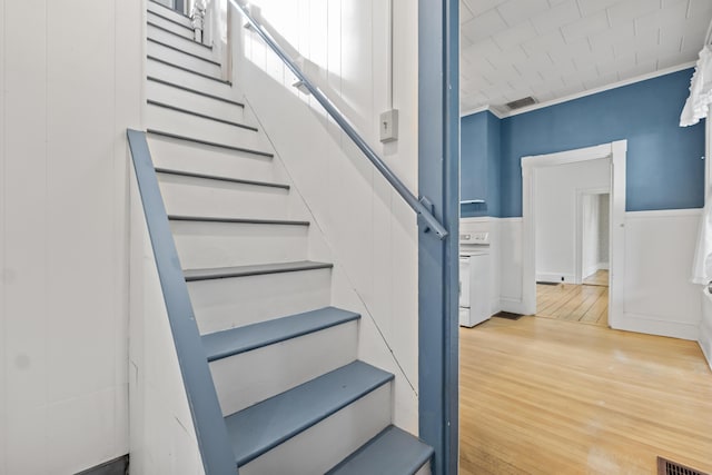 11 Center St, Richmond, ME 04357 - stairway with wood finished floors and a wainscoted wall