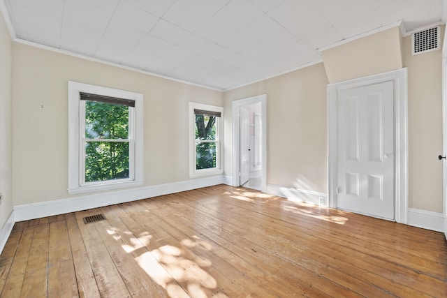 11 Center St, Richmond, ME 04357 - spare room featuring crown molding, hardwood / wood-style floors, and baseboards