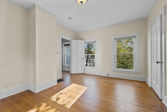11 Center St, Richmond, ME 04357 - unfurnished room featuring ornamental molding, hardwood / wood-style flooring, and baseboards
