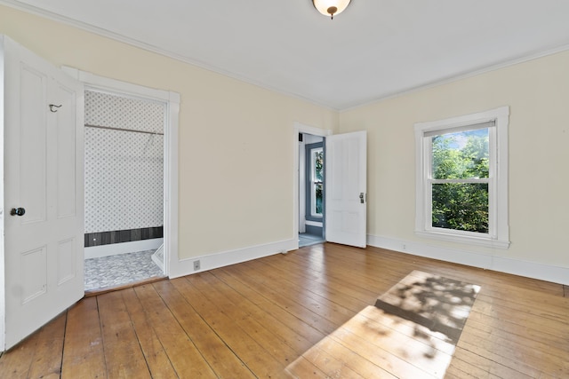 11 Center St, Richmond, ME 04357 - unfurnished room with wood-type flooring, ornamental molding, and baseboards