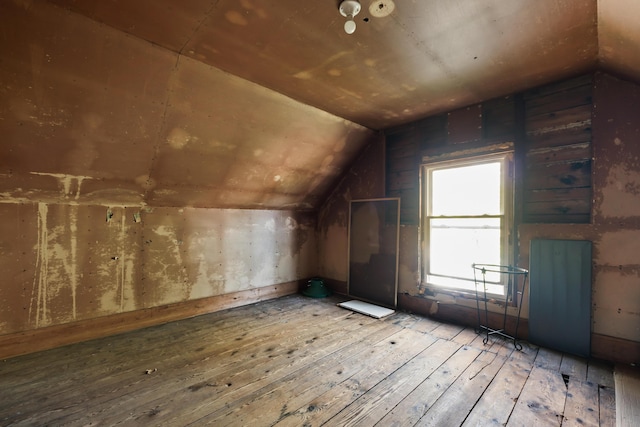 11 Center St, Richmond, ME 04357 - bonus room featuring lofted ceiling and hardwood / wood-style floors