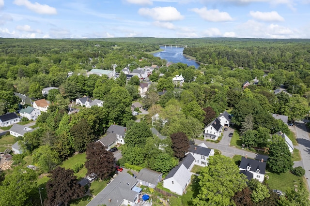 11 Center St, Richmond, ME 04357 - aerial view of residential area with a heavily wooded area and a nearby body of water