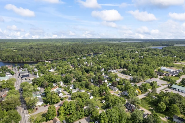 11 Center St, Richmond, ME 04357 - bird's eye view of a heavily wooded area and a nearby body of water