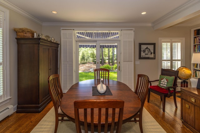 10 Clam Cove Dr, Rockport, ME 04856 - dining room with a baseboard radiator, wood finished floors, plenty of natural light, crown molding, and recessed lighting