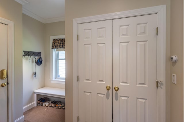 10 Clam Cove Dr, Rockport, ME 04856 - mudroom with carpet floors, baseboards, and ornamental molding