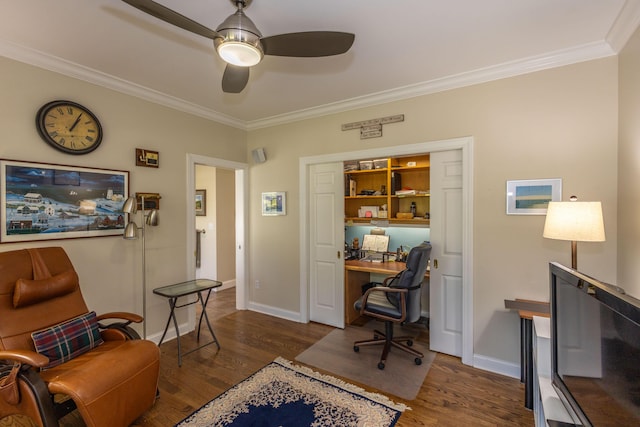10 Clam Cove Dr, Rockport, ME 04856 - home office with crown molding, ceiling fan, wood finished floors, built in desk, and baseboards
