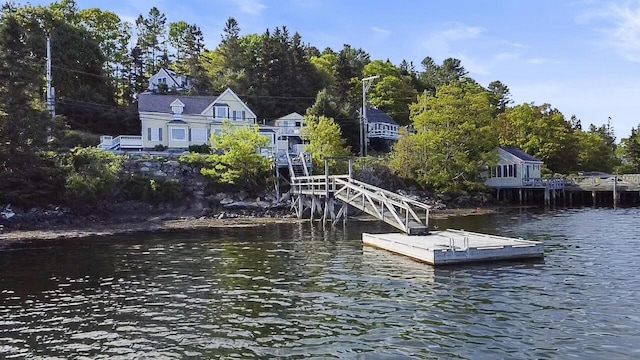 23 Western Ave, Boothbay Harbor, ME 04538 - dock featuring a water view and view of wooded area