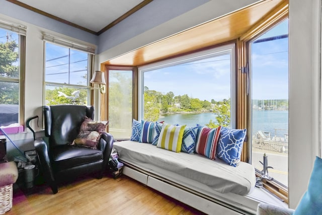 23 Western Ave, Boothbay Harbor, ME 04538 - sunroom / solarium featuring a water view, crown molding, and wood finished floors