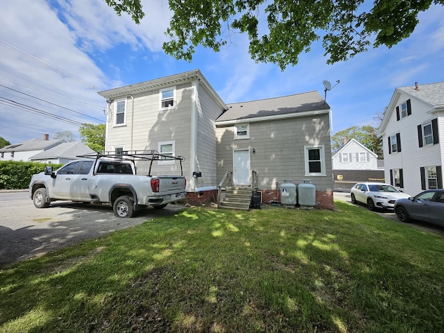 42-44 Richardson St, Bath, ME 04530 - rear view of property featuring entry steps and a yard