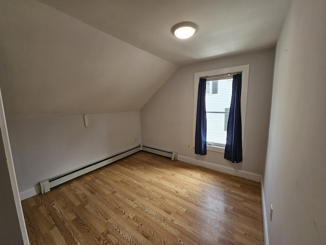 42-44 Richardson St, Bath, ME 04530 - bonus room with wood finished floors, lofted ceiling, a baseboard heating unit, and baseboards