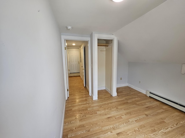 42-44 Richardson St, Bath, ME 04530 - additional living space with light wood-style floors, a baseboard radiator, vaulted ceiling, and baseboards