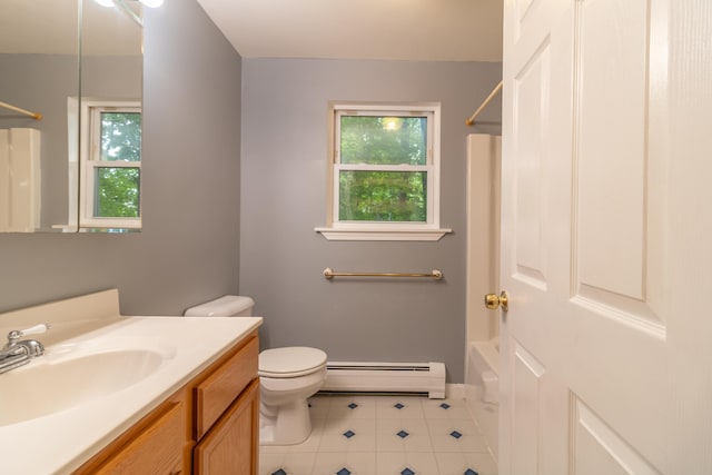 14 Carter Ln, Brewer, ME 04412 - bathroom with a baseboard heating unit, vanity, tile patterned flooring, toilet, and shower / bathtub combination