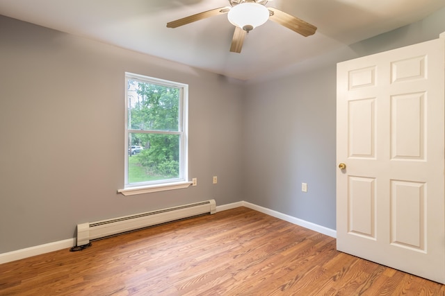 14 Carter Ln, Brewer, ME 04412 - spare room featuring a baseboard heating unit, light wood-type flooring, baseboards, and ceiling fan