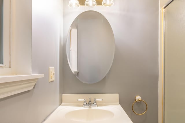 14 Carter Ln, Brewer, ME 04412 - full bathroom featuring a shower with shower door and vanity
