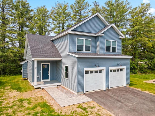 21 Arnies Alley -, Westbrook, ME 04092 - view of front of home with a garage, driveway, a shingled roof, and a front yard