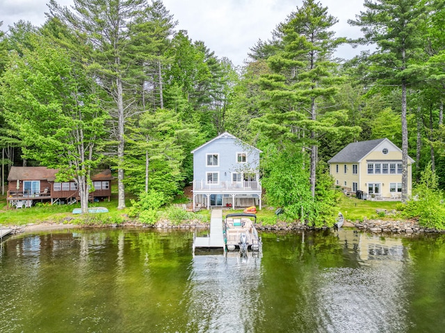33-34 Gerber Ln, Monmouth, ME 04259 - water view featuring a boat dock and a forest