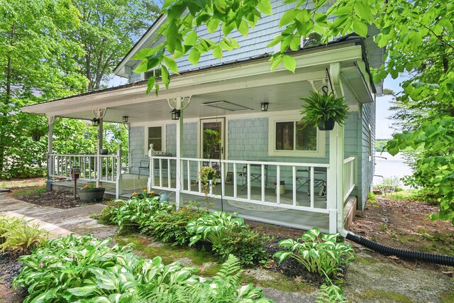 33-34 Gerber Ln, Monmouth, ME 04259 - back of house with a porch
