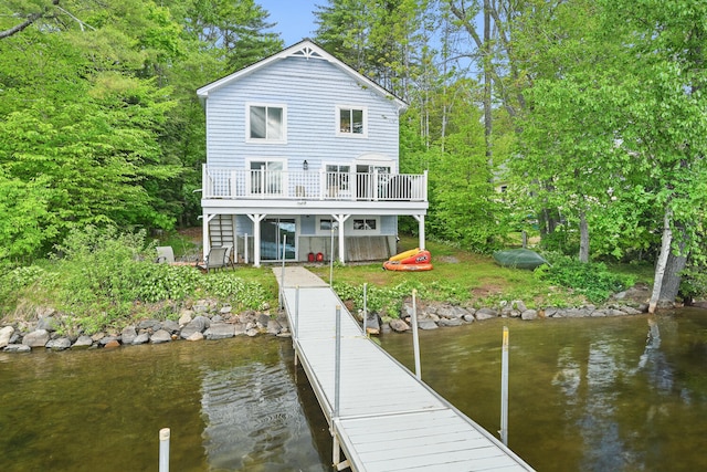 33-34 Gerber Ln, Monmouth, ME 04259 - back of house featuring a water view